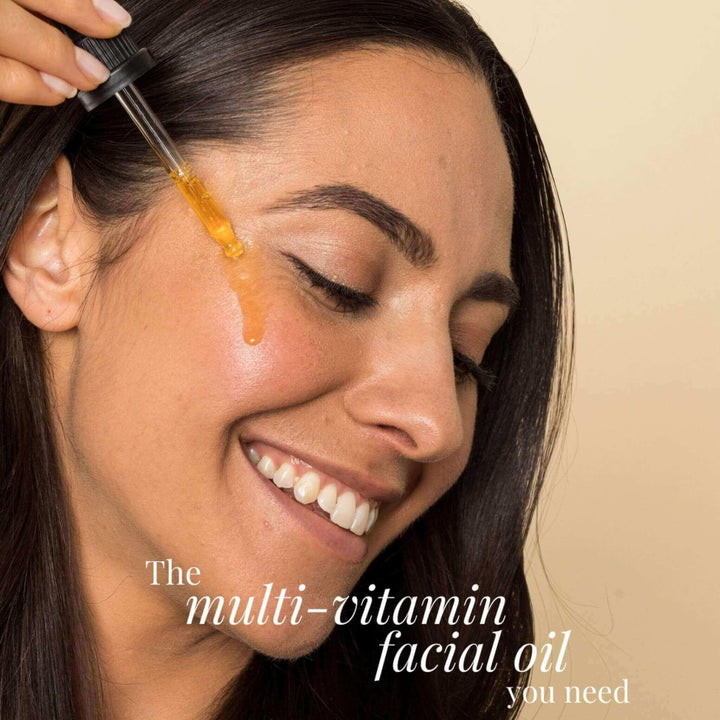 Woman applying hydrating face oil by Organic Potions