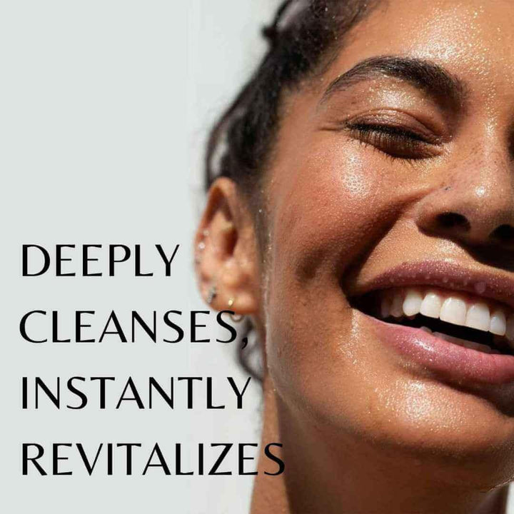 happy women face, applying on cleanser gel on her face